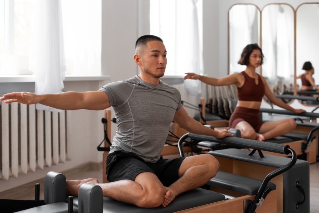 Man Doing Reformer Pilates