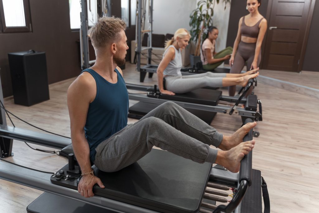Man Taking Pilates Class